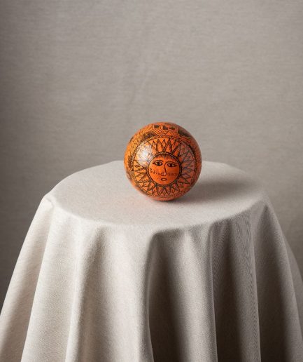esfera naranja con sol